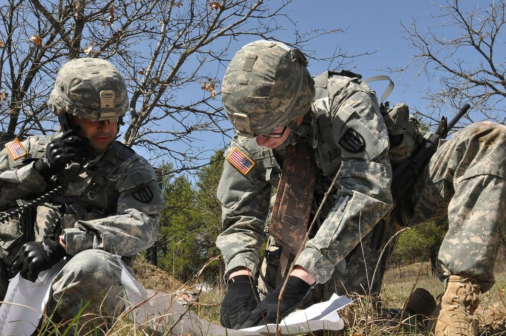 Members of the 348th Engineer Company conduct medical evacuation procedures by evaluating and providing aid to a casualty…