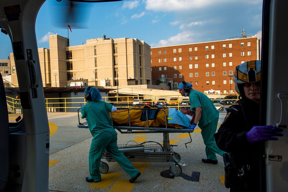 Nurses from MedStar DC hospital take take a vehicle accident victim into the hospital after being MedEvaced, June, 16 2014…