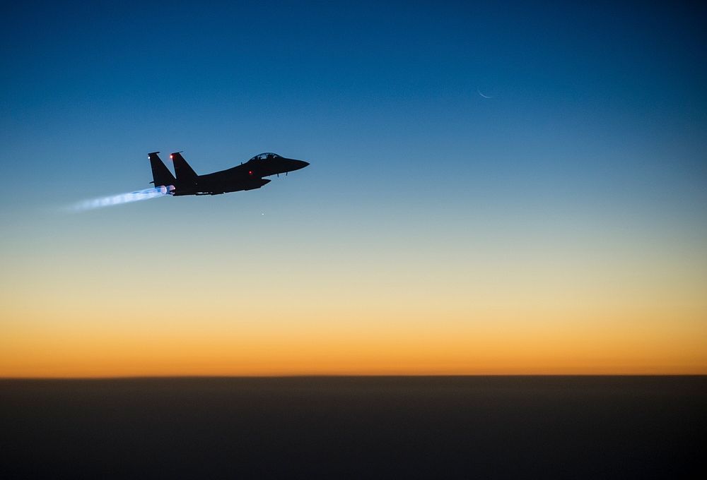 A U.S. Air Force F-15E Strike Eagle aircraft flies over northern Iraq Sept. 23, 2014, after conducting airstrikes in Syria.