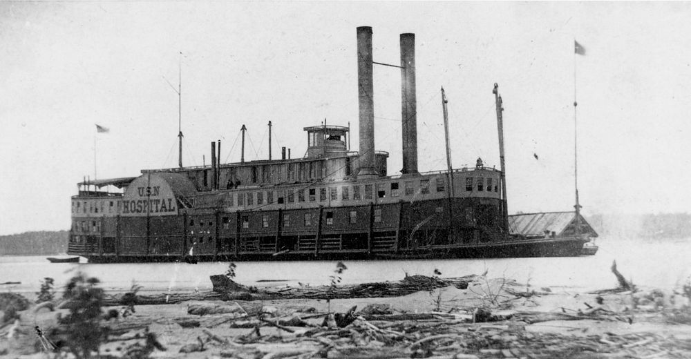 USS Red Rover (1862-1865). With an ice barge tied up to her port side on the Western Rivers during the Civil War. [Hospital…