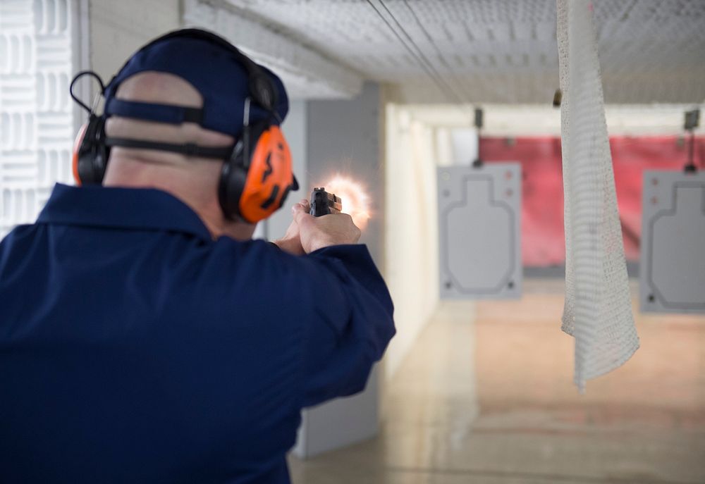 NEW LONDON, Conn. -- Members of the First Coast Guard District train at the firing range at the U.S. Coast Guard Academy…