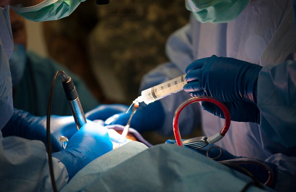 A patient receives oral surgery during a 212th Combat Support Hospital field medical training exercise at Miesau Army Depot…