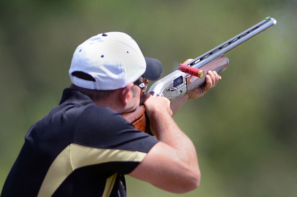 Army Spc. Dustin Taylor, a member of the Army Skeet Team, shoots during the 2015 Armed Services Skeet Championships. The…
