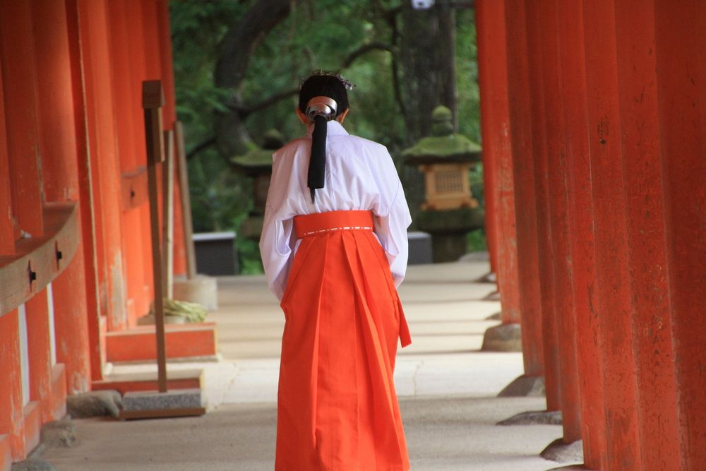 Japanese woman at shrine. Free public domain CC0 photo.