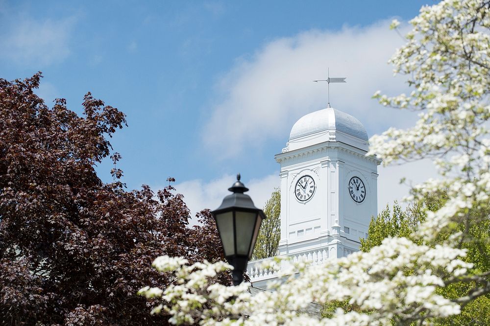 NEW LONDON, Conn. -- The Hamilton Hall clock tower can be seen above blooming trees at the U.S. Coast Guard Academy May 11…