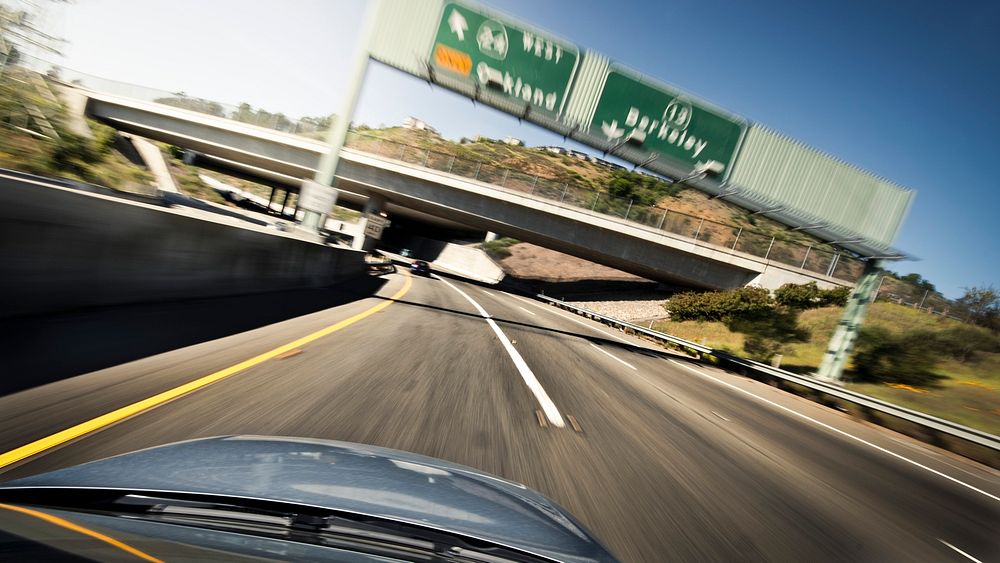 Speedy car on a road. Free public domain CC0 photo