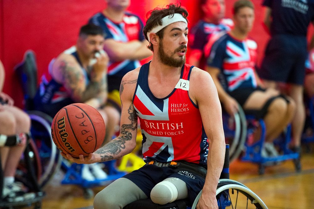United Kingdom&rsquo;s United Kingdom&rsquo;s Chris Middleton looks to pass a ball during wheelchair basketball preliminary…