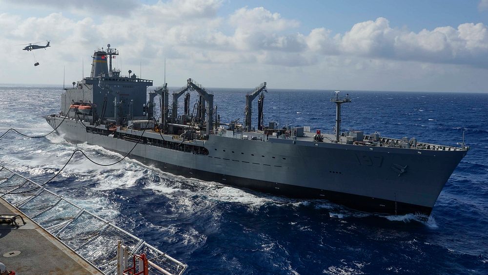 PHILIPPINE SEA (July 17, 2015) The fleet replenishment oiler USNS Pecos (T-AO 197) conducts an underway replenishment with…