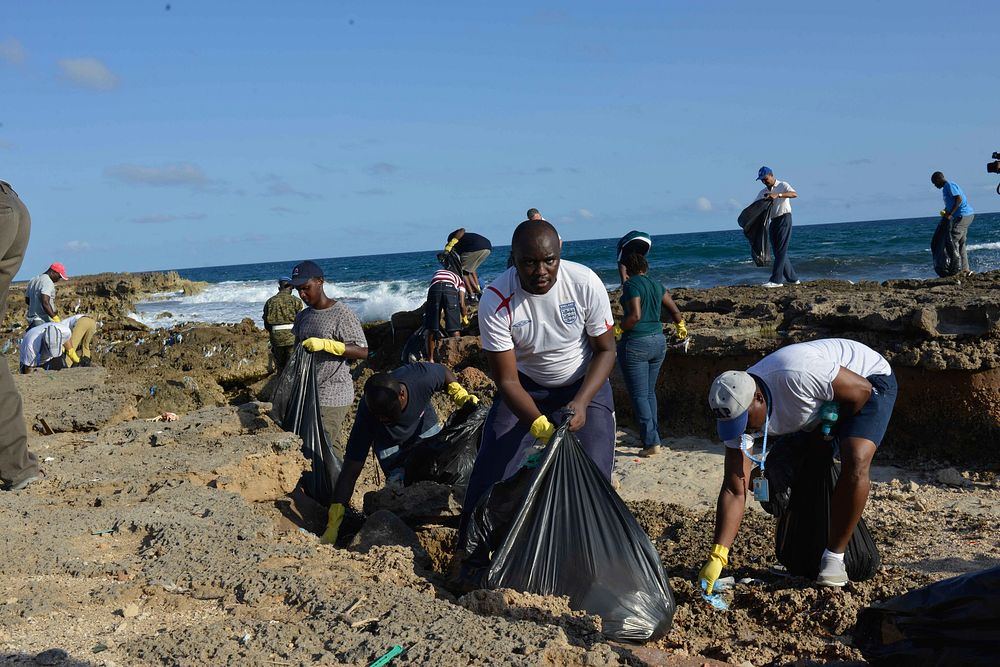Staff of the United Nations in Somalia collect garbage during a clean-up exercise of the seashore in Mogadishu, Somalia. The…