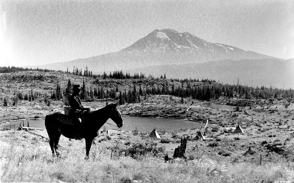 Horseback rider with Mt Adams, Columbia NF, WA 1937. Original public domain image from Flickr