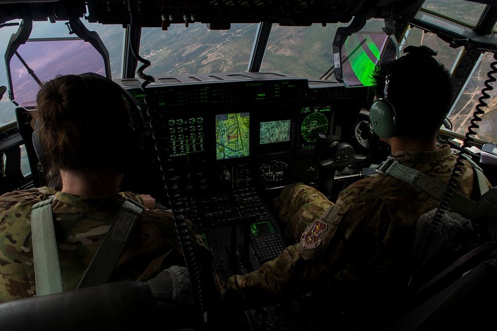 Two pilots, assigned to the 71st Rescue Squadron at Moody Air Force Base, Ga., fly a C-130J Hercules during rescue and…