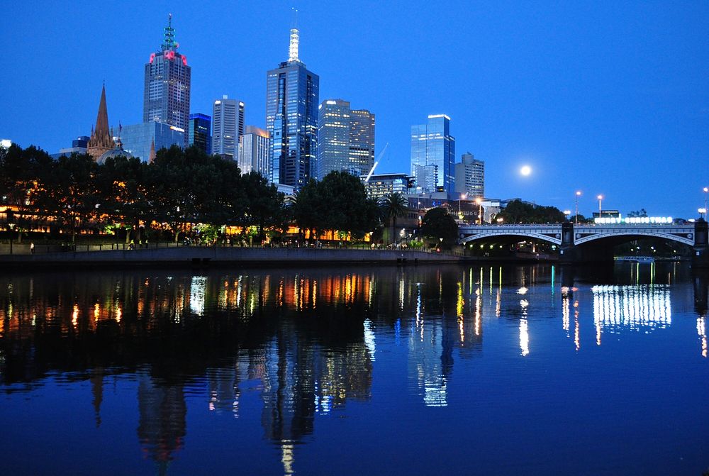 Melbourne skyline with full moon rising.