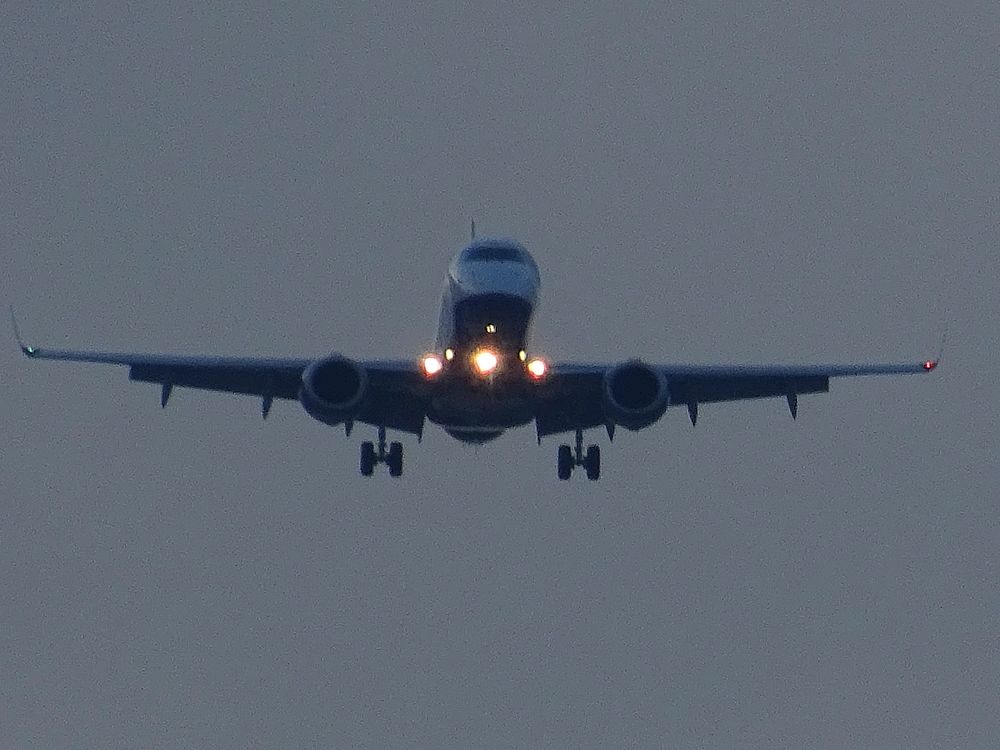 Airplane flying in the sky. Free public domain CC0 photo.