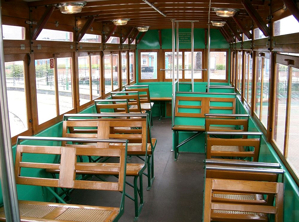 Inside the upper deck of Birkenhead 69, which is replica of a Hong Kong tramcar.