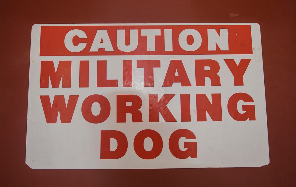 A caution sign marks the entrance to kennels belonging to U.S. Army military working dogs assigned to the 549th Military…