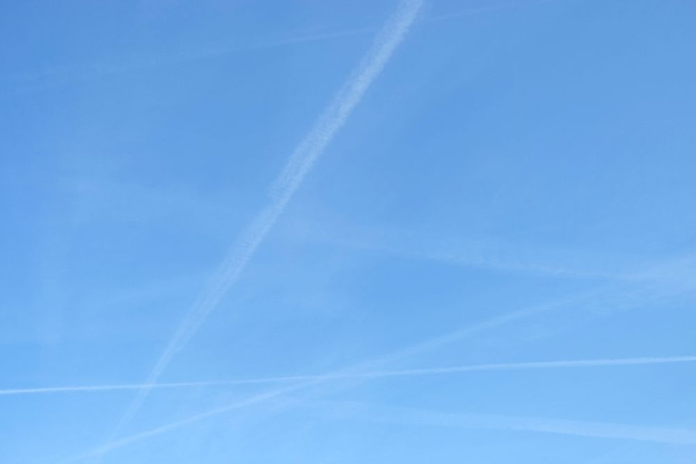 Contrails. Condensation trails in the sky near Amsterdam, the Netherlands.