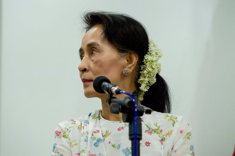 Myanmar Foreign Minister San Suu Kyi Listens to Secretary Kerry Address Reporters during a News Conference following their…