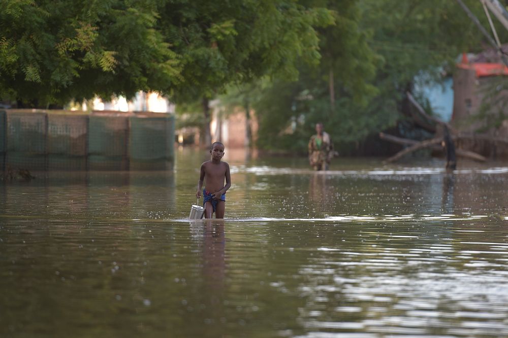 A boy negotiates flood waters in Beletweyne, Somalia, on May 27, 2016. Beletweyne is currently experiencing its worst…