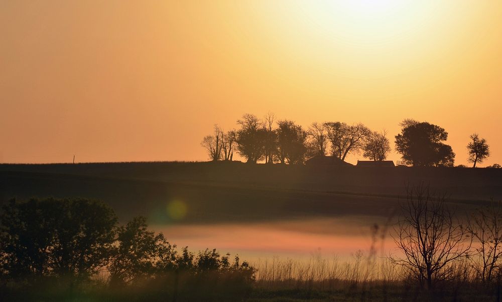 A colorful sunrisePhoto by Joanna Gilkeson/USFWS. Original public domain image from Flickr