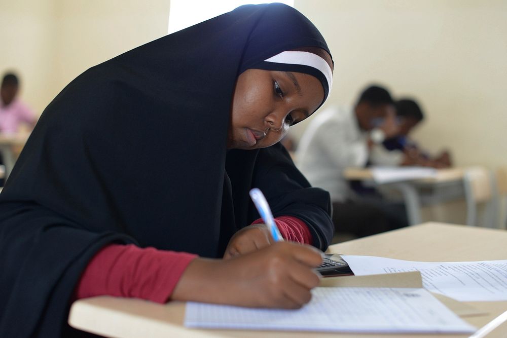 A student sits an exam at SIMAD University, one of the private universities in Mogadishu, Somalia on January 2, 2016. AMISOM…