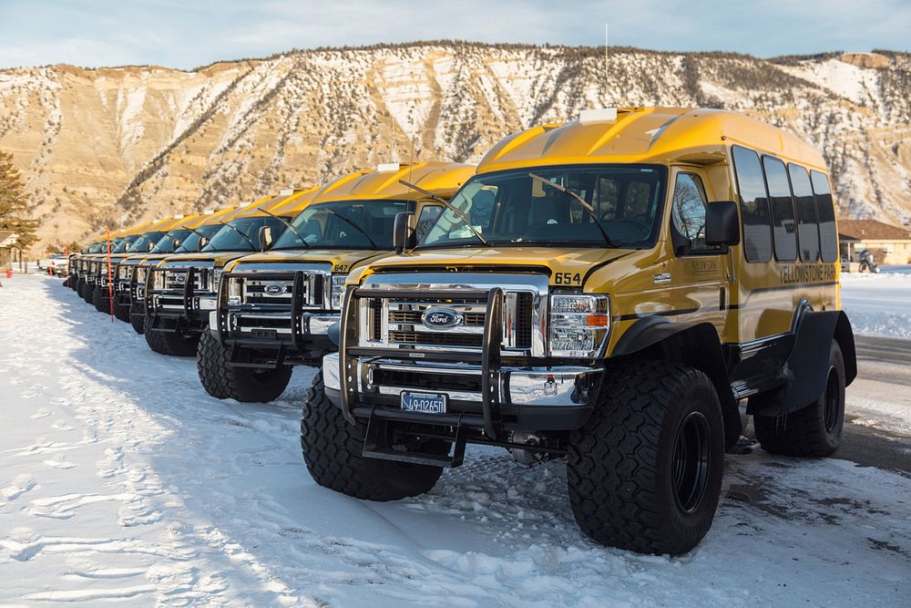 Snowcoaches prepare for winter season by Jacob W. Frank. Original public domain image from Flickr
