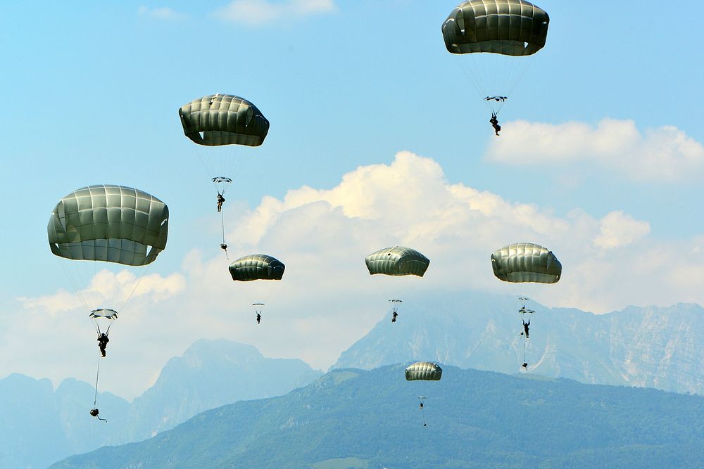 U.S. Army paratroopers assigned to the 54th Engineer Battalion, 173rd Airborne Brigade, conduct an airborne operation from a…