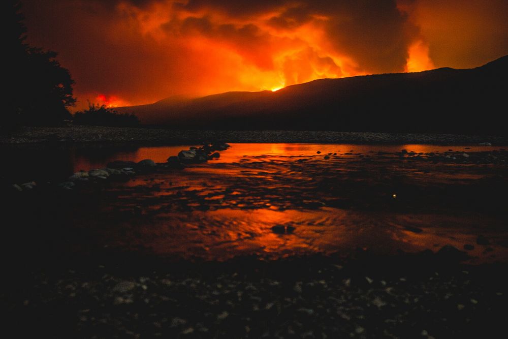 Fish Creek reflecting the fire's glow. Original public domain image from Flickr