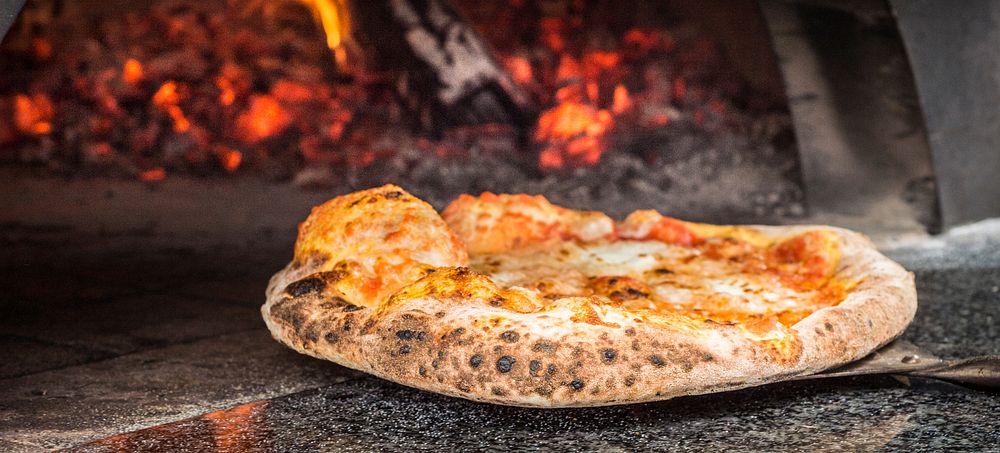 Timber Pizza Company wood fire mobile brick oven creates intense heat that cooks pizza in minutes at the U.S. Department of…