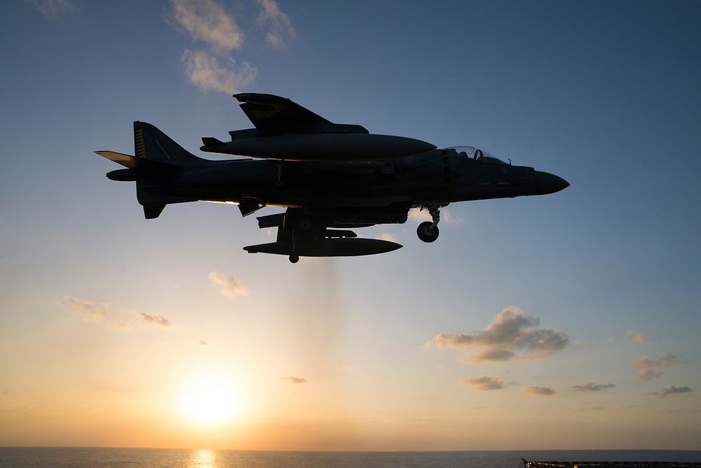 MEDITERRANEAN SEA (Aug. 14, 2016) An AV-8B Harrier, from the 22nd Marine Expeditionary Unit (MEU), lands on the flight deck…