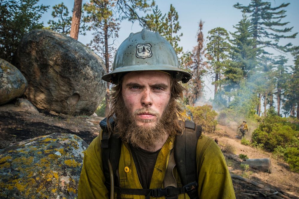 U.S. Department of Agriculture (USDA) Forest Service (FS) Smith River Hotshots Forestry Technician Shane Blair mitigate…