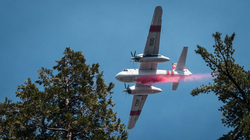 Cedar Fire aerial fire retardant and water operations on Black Mountain in the U.S. Department of Agriculture (USDA) Forest…