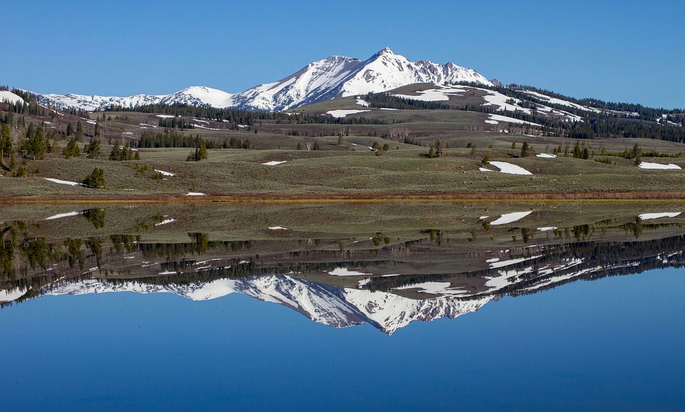 Electric Peak reflected in Swan Lake. Original public domain image from Flickr