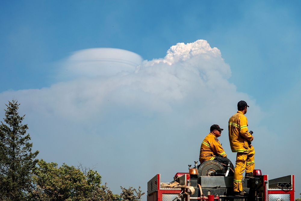 Firefighters monitor fires and smoke columns during the Mendocino National Forest, California. Original public domain image…