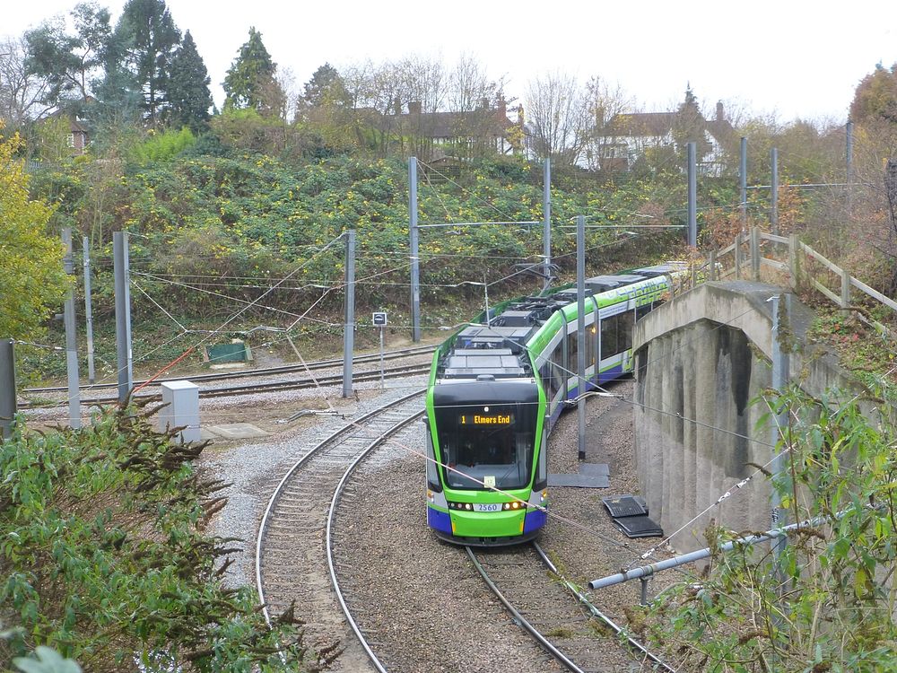 Stadtler Croydon / London Tramlink tram No. 2560 slowly negotiating a section of sharply curved track near to Sandilands…