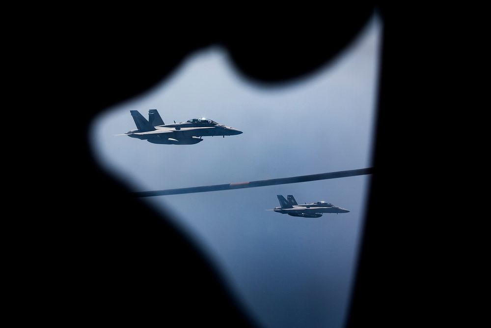 Two F/A-18D Hornets approach a KC-130J with Marine Aerial Refueler Transport Squadron 352 during a Special Purpose Marine…