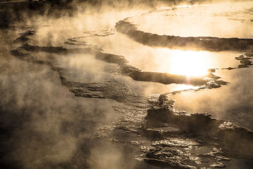 Great Fountain Geyser terraces at sunset. Original public domain image from Flickr