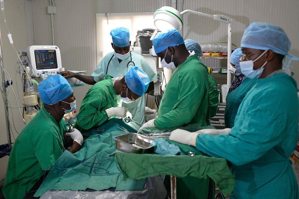 Dr. James Kiyengo and his team of surgeons, anesthesiologists and nurses perform cleft lip and palate surgery at the AMISOM…