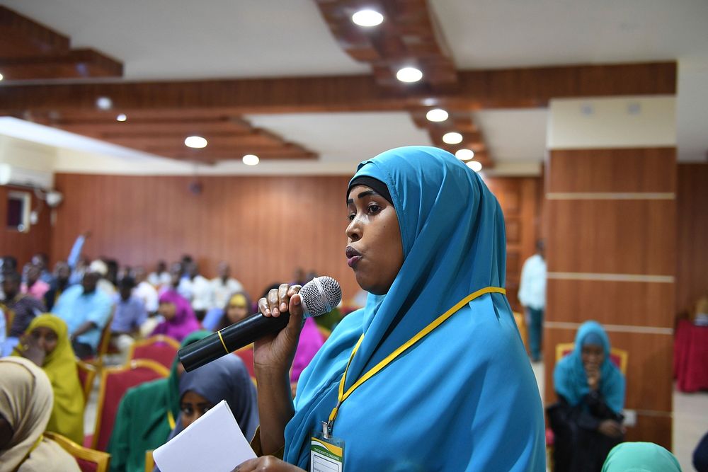 A participant speaks during a dialogue on 16 days of Activism Against Gender-Based Violence in Mogadishu, Somalia on…