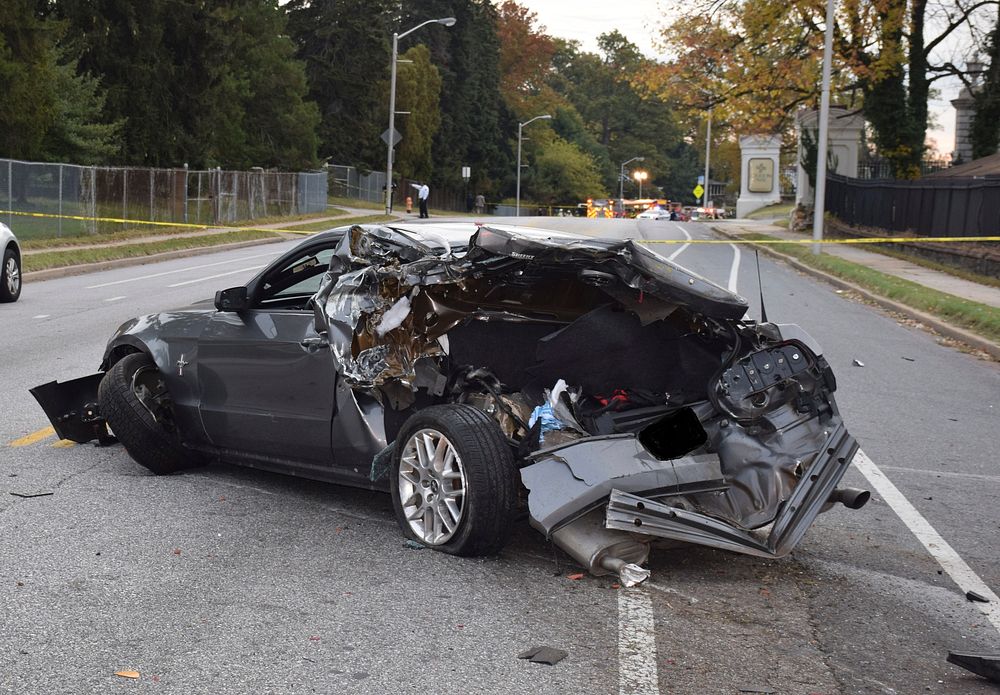 Premium Vector  Illustration showing car crash with two people standing  near the cars