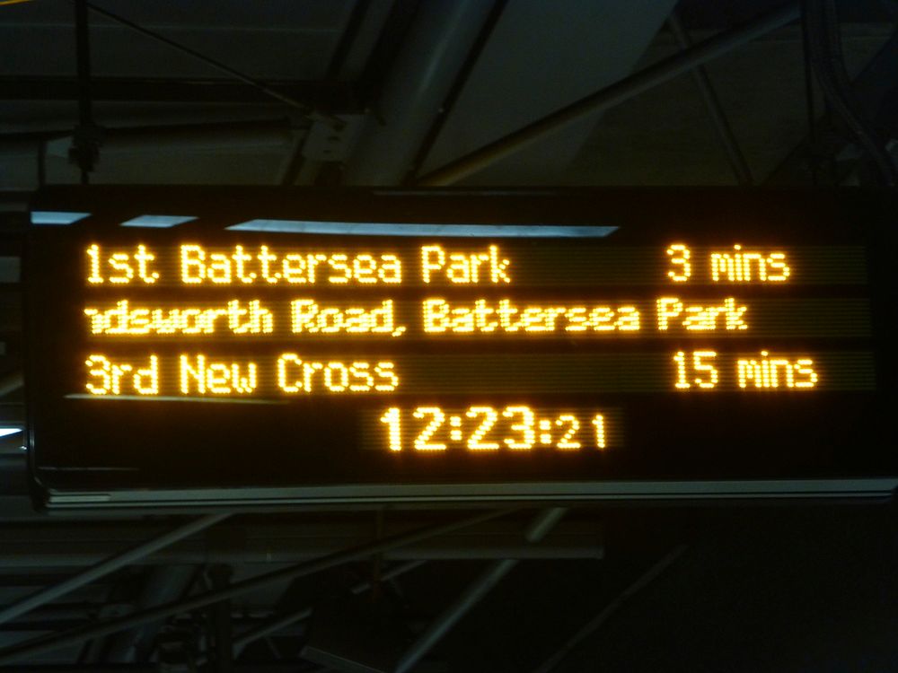 A train describer at Canada Water station showing that the first train is travelling to Battersea Park station.