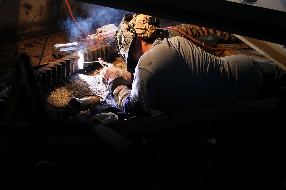 CHEASAPEAKE, Va. - A contractor repairs chipped gear teeth on the North Landing Bridge