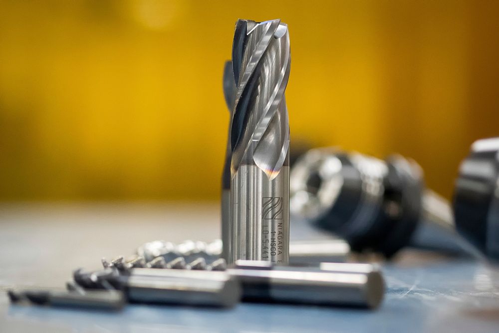 Drill bits used for cutting sit on a table at the 3rd Maintenance Squadron metals fabrication shop on Joint Base Elmendorf…