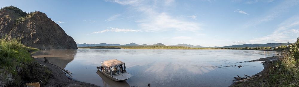 Panorama of Yukon River from the banks in Eagle, Alaska. Eagle bluff pictured on the left.NPS Photo / Sean Tevebaugh 2016.…