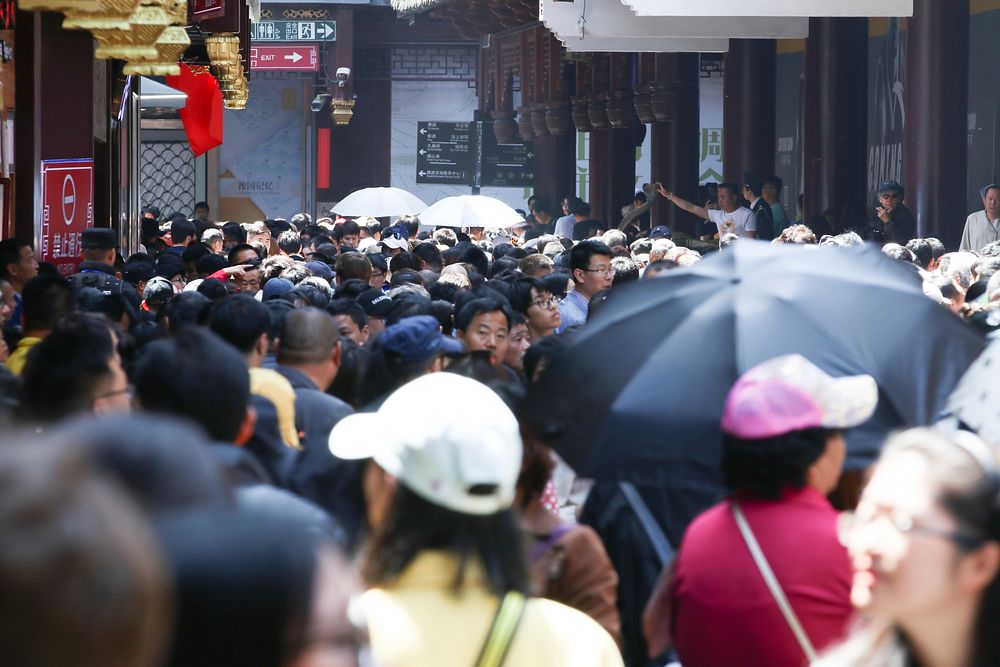 Crowd in busy city. Free public domain CC0 photo.