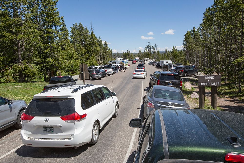 Crowded parking lot, Brink of Lower Falls by Neal Herbert. Original public domain image from Flickr