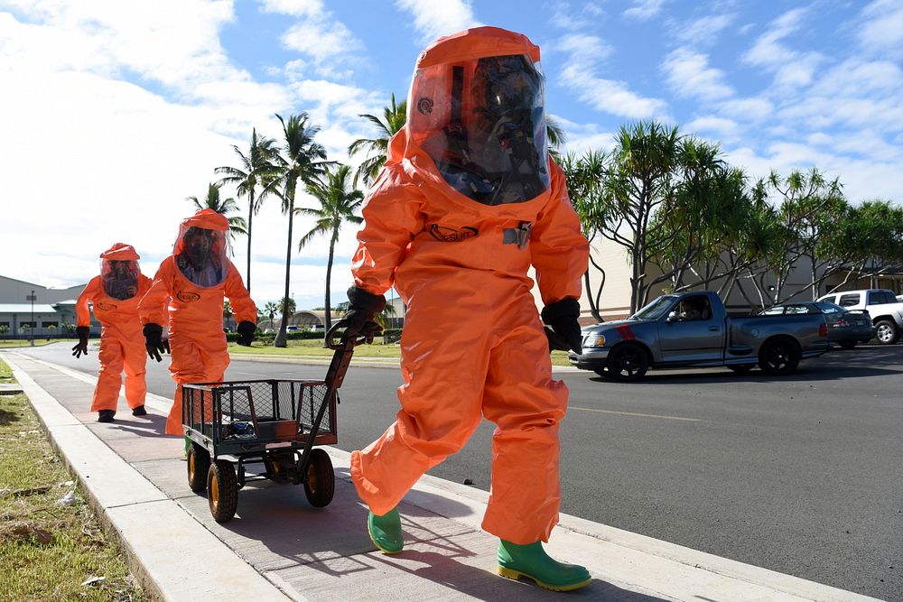 Hawaii Air National Guard, accesses chemical findings during a Chemical, Biological, Radiological, Nuclear and Explosive…