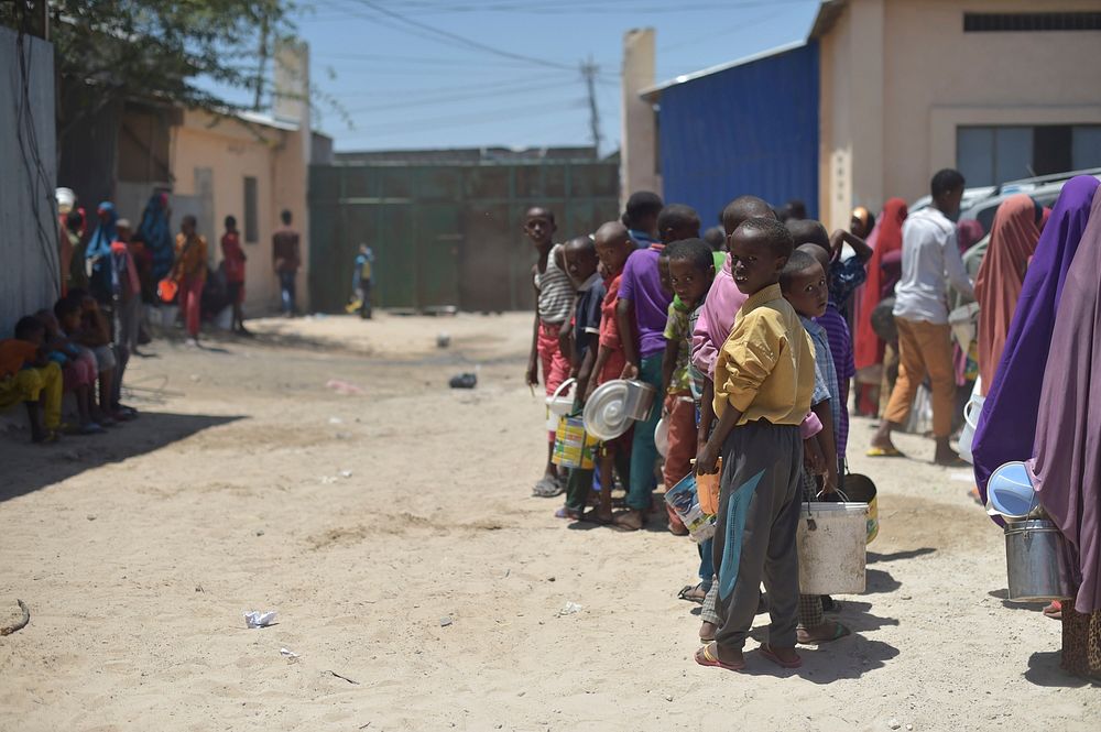 Children line up at a feeding centre in Mogadishu, Somalia, on March 9, 2017.