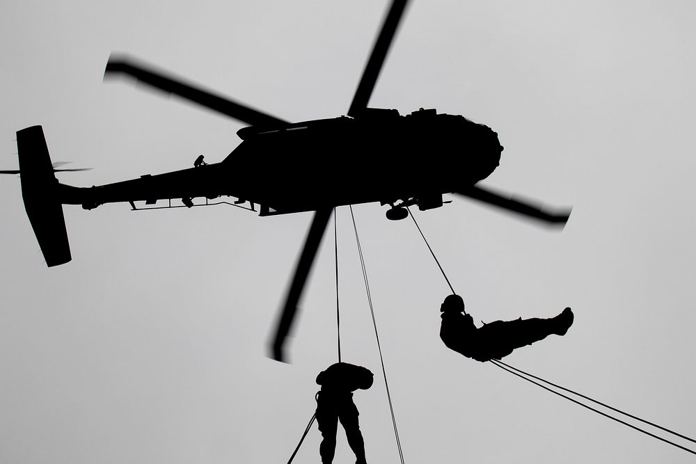 U.S. Army Air Assault students practice rappelling out of a Black Hawk helicopter on day nine of Air Assault School&rsquo;s…