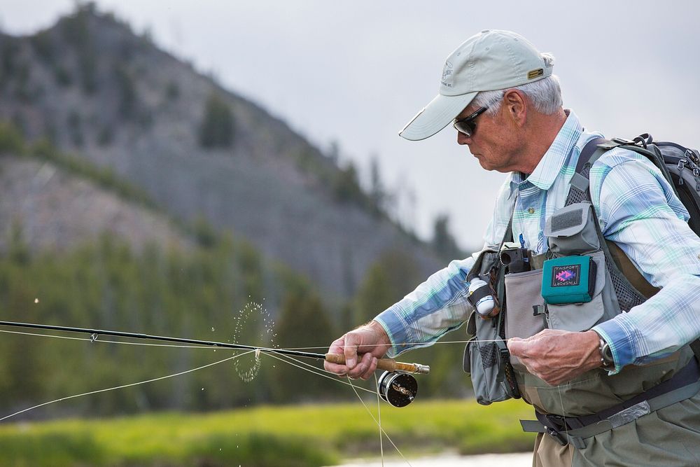 Fly fishing on the Madison River by Neal Herbert. Original public domain image from Flickr