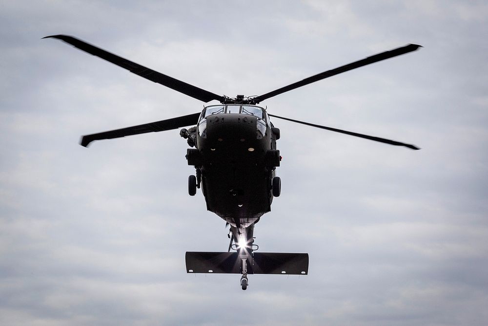 A U.S. Army UH-60M Black Hawk illuminates the landing zone prior to touching down at Col Victory at Joint Base McGuire-Dix…